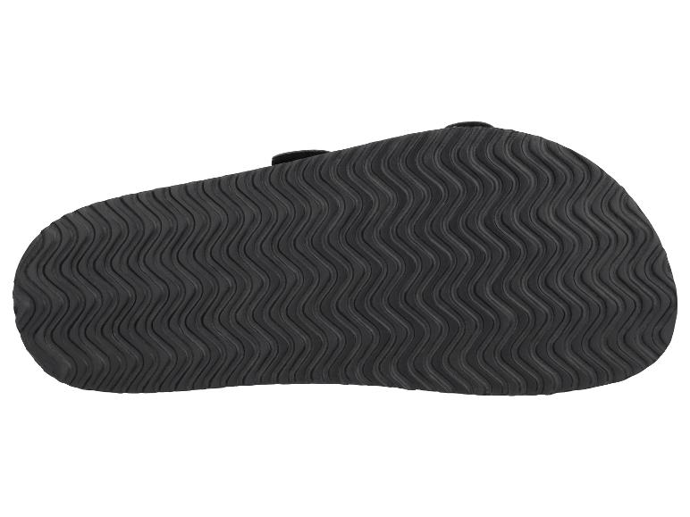 Schwarze Antirutschsohle mit Wellenmuster