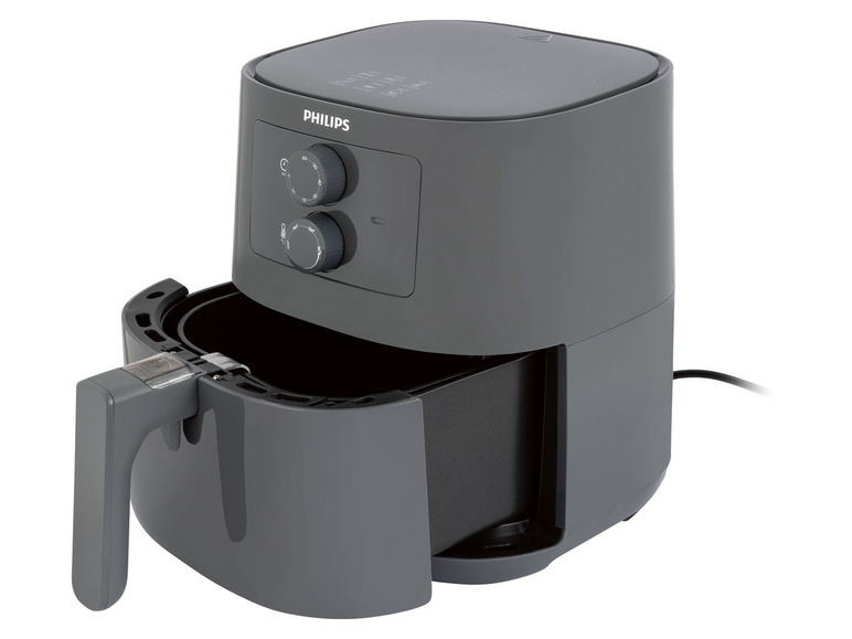 Eine graue Philips Airfryer mit offenem Korb.