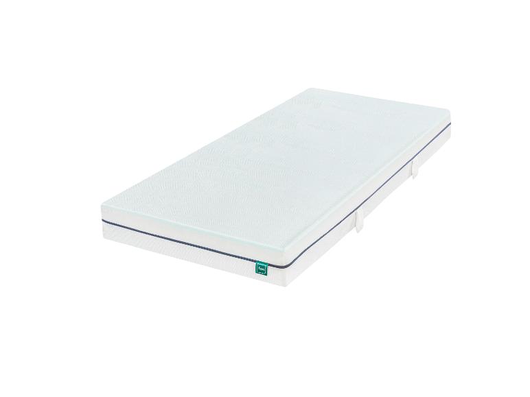 Weiße Matratze mit blauem Rand und grünem Etikett