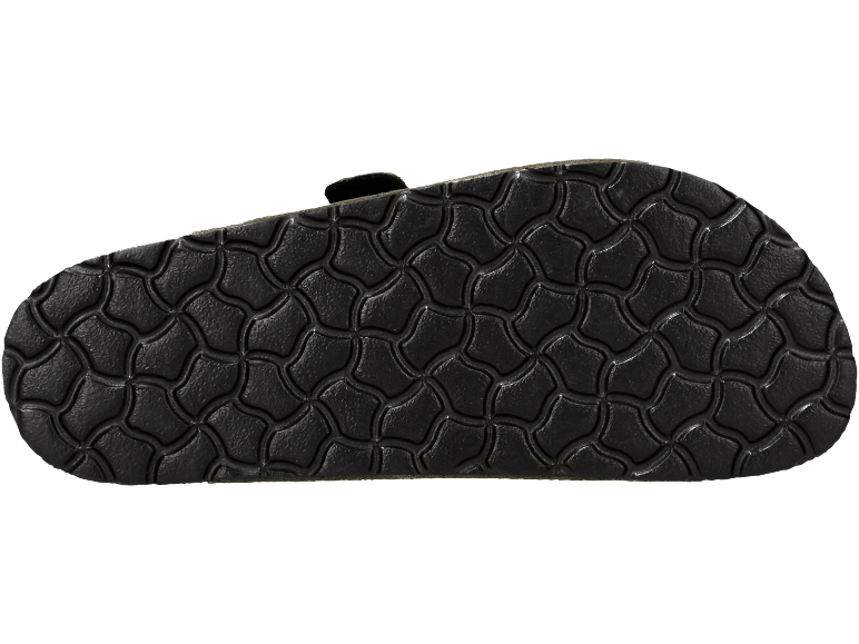 Sohle einer Sandale oder eines Slippers mit rutschfestem Schuppenmuster.