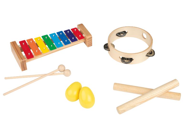Kinder-Musikinstrumenten-Set mit Xylophon, Tamburin, Maracas und Rhythmusstäben.