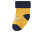 Gelbe Socke mit blauen Details und Tiermotiv.