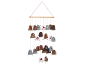 Weihnachtlicher Adventskalender mit 24 nummerierten Stoffbeuteln in verschiedenen Farben und festlichen Designs.