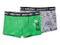 Zwei Jungen-Boxershorts, eine grüne mit Monster-Motiv, eine graue mit Charakter-Prints.