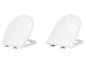 Zwei weiße LIVARNO® WC-Sitze aus Duroplast in O- und D-Form.