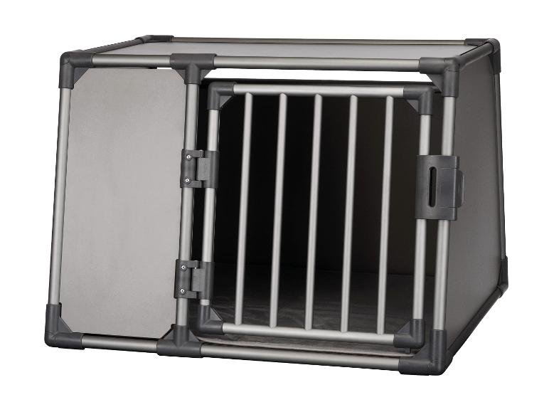 Transportbox für Haustiere aus Aluminium und Kunststoff mit Gittertür.