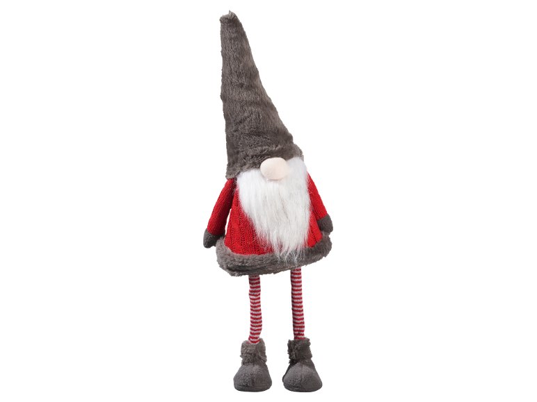 Ein Plüschgnom mit weißem Bart, grauem Hut und roter Kleidung.