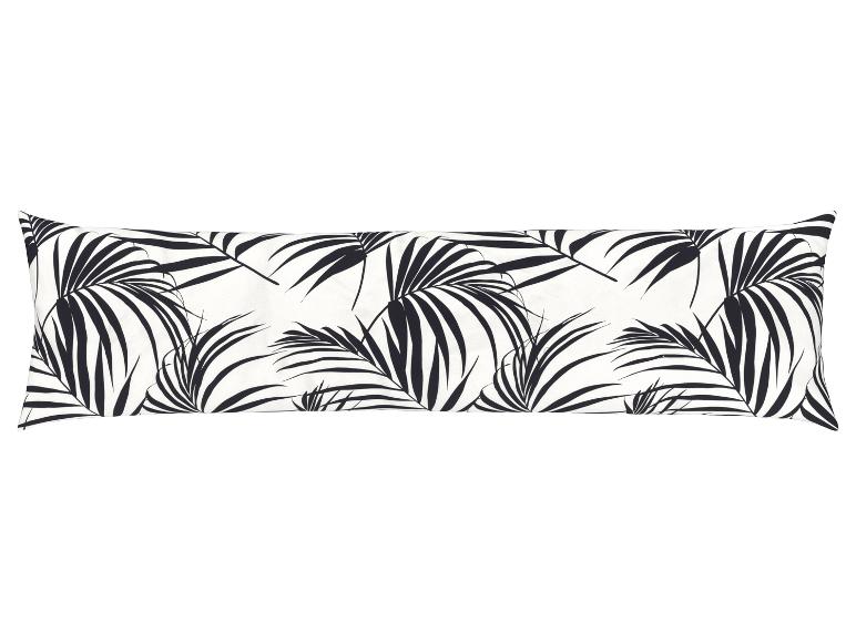 Ein weißes Kissen mit einem schwarzen Palmblatt-Muster.