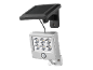 Silberne LED-Solarleuchte mit Bewegungssensor und Solarpanel.
