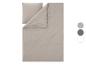 Einfarbiges beiges Bettwäsche-Set mit Kissen und Bettbezug, mit Farbmustern.