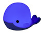 Eine blaue Nachtlampe in Form eines Wals.
