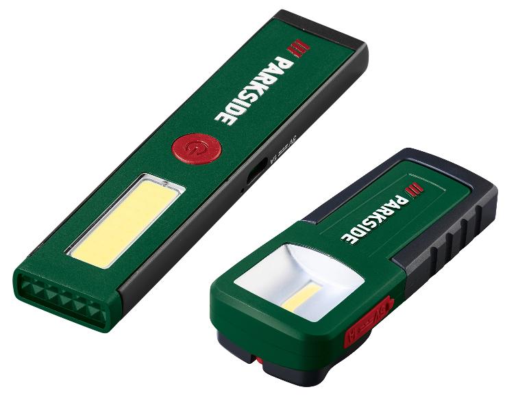 Zwei grüne und schwarze Parkside-Taschenlampen mit LED-Lichtern und roten Knöpfen.