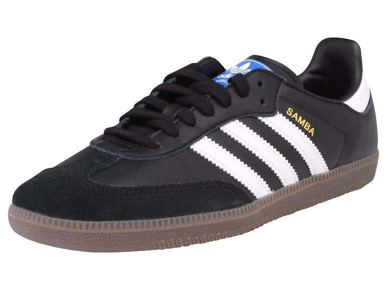 Schwarze Sportschuhe mit weißen Streifen und brauner Sohle