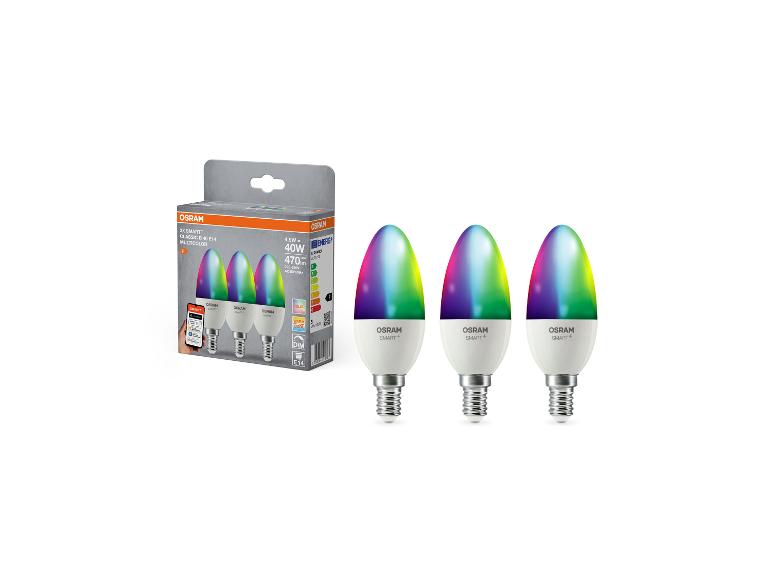 Set aus drei smarten mehrfarbigen LED-Kerzenlampen mit E14-Fassung und Verpackung.