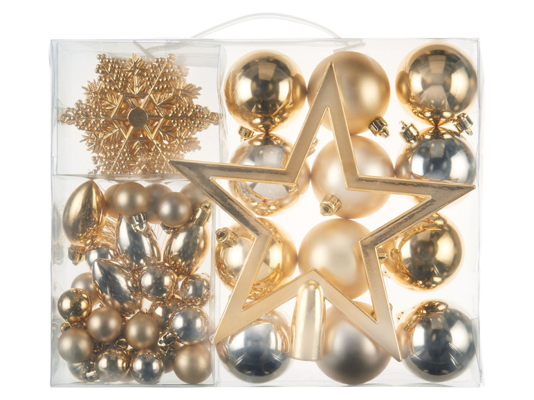 Eine Box mit goldenen und silbernen Weihnachtsbaumschmuck, darunter Kugeln und einen Stern.