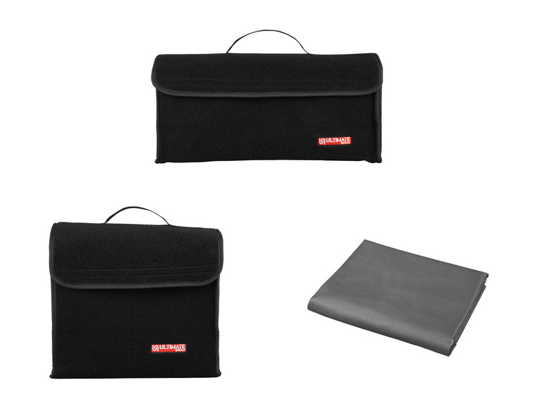 Zwei schwarze Ultimate Speed ​​Aufbewahrungstaschen und eine graue Matte.