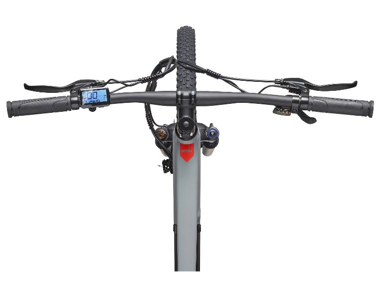 E-Bike-Lenker mit Display, Schalthebeln und Reifen von oben gesehen.