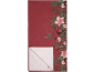 Roter Tischläufer mit Weihnachtsmotiv aus Blumen, Beeren und Tannenzweigen.