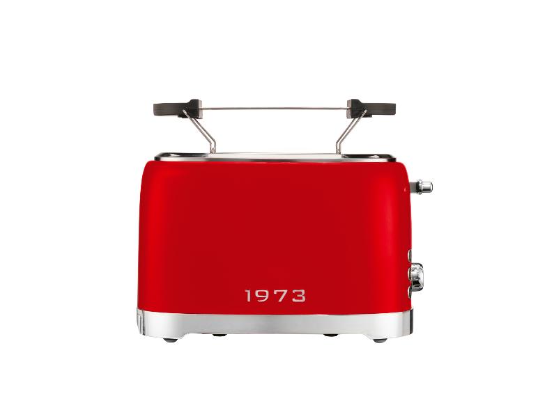 Roter Toaster mit der Aufschrift „1973“ auf weißem Hintergrund.