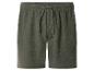 Dunkelgrüne Herren-Shorts aus gekreppter Baumwolle mit Gummizug und Kordelzug.