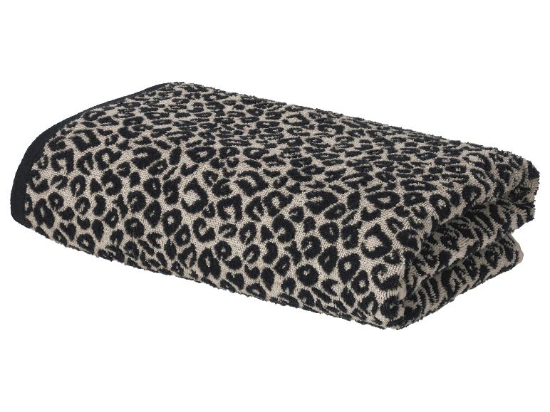 Gefaltetes Handtuch mit Leopardenmuster in Schwarz und Beige