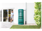 Grüne Regentonne und Regenwassersystem für zu Hause.