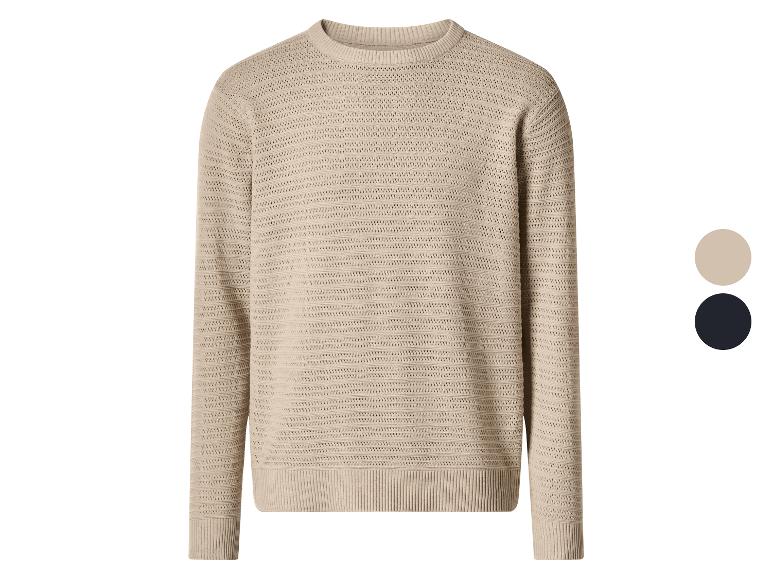 Beiger Strickpullover mit zwei Farbmustern: Beige und Schwarz.