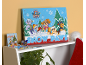 Adventskalender mit Welpenmotiv, daneben eine Weihnachtskarte und Schreibwaren.