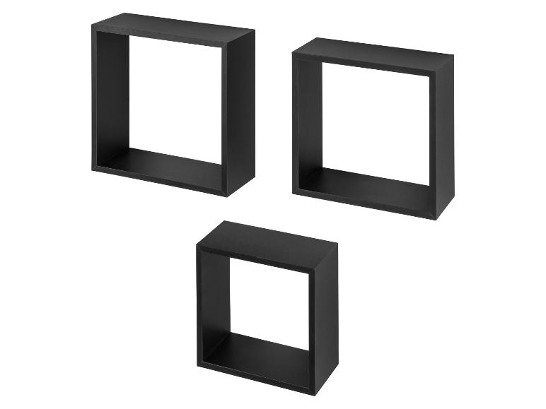 Drei schwarze, rechteckige Wandregale in verschiedenen Größen