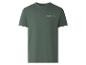 Grünes T-Shirt mit dem Text „Thrive in the unknown“