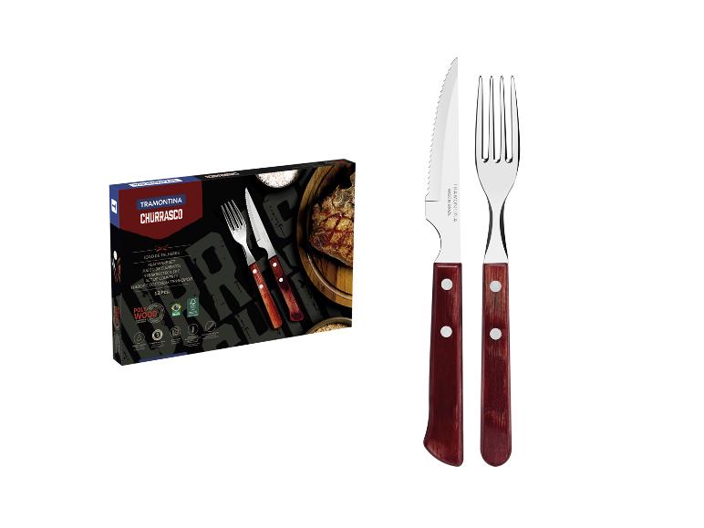 Steakbesteck-Set mit Holzgriffen, bestehend aus Messern und Gabeln, in einer Box.