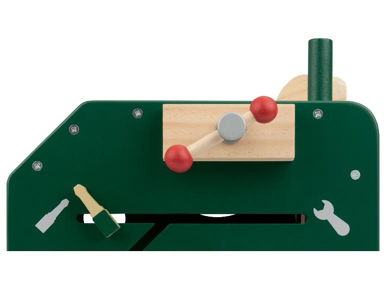 Grünes Holzspielzeug mit rotem Hebel und Werkzeugen.