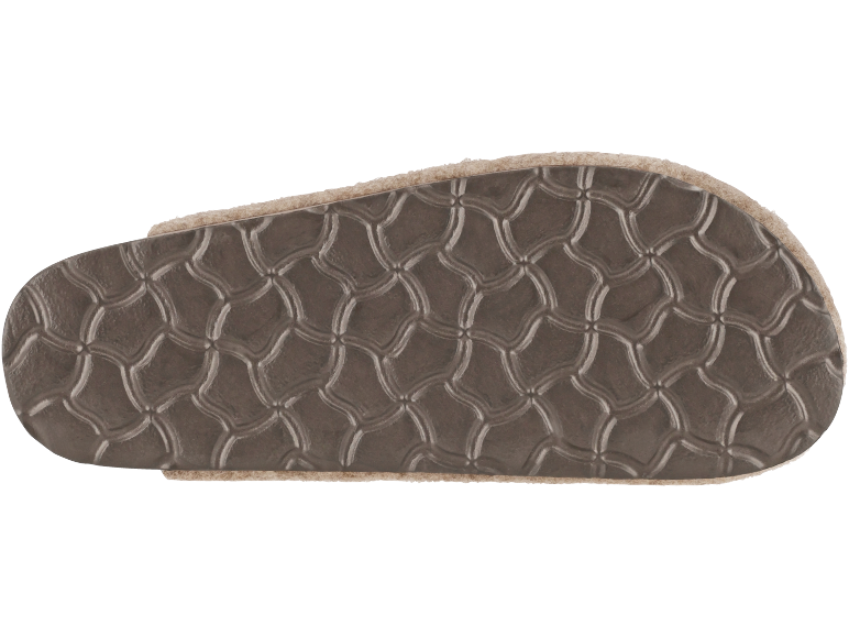 Braune Schuhsohle mit geprägtem Muster und flauschigem Rand