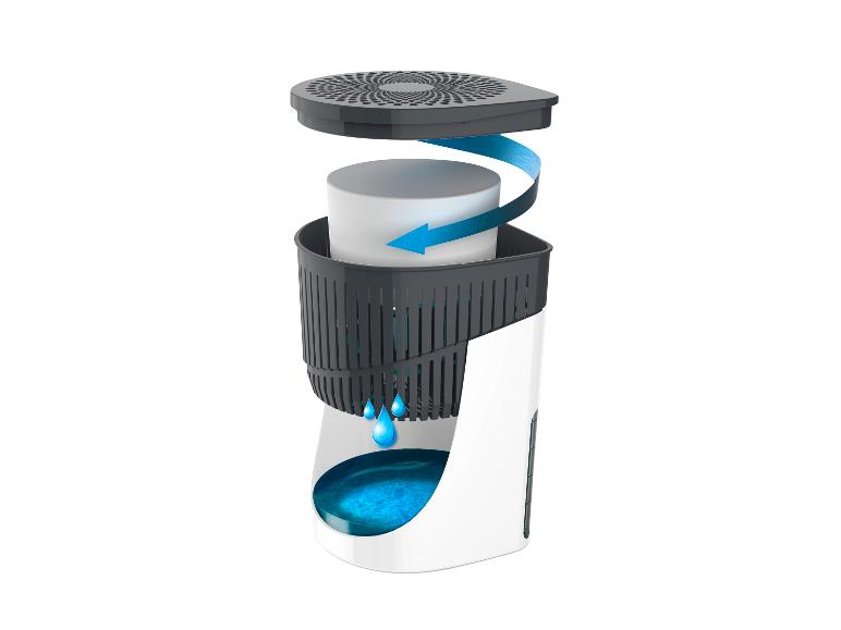 Luftentfeuchter mit herausnehmbarem Filter und Wasserbehälter.