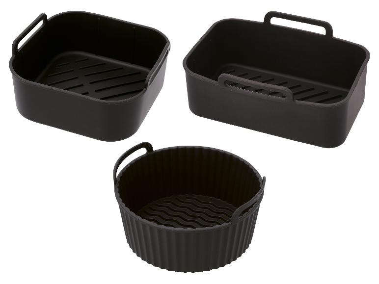 Drei schwarze Silikon-Einlagen für Heißluftfritteusen in verschiedenen Formen