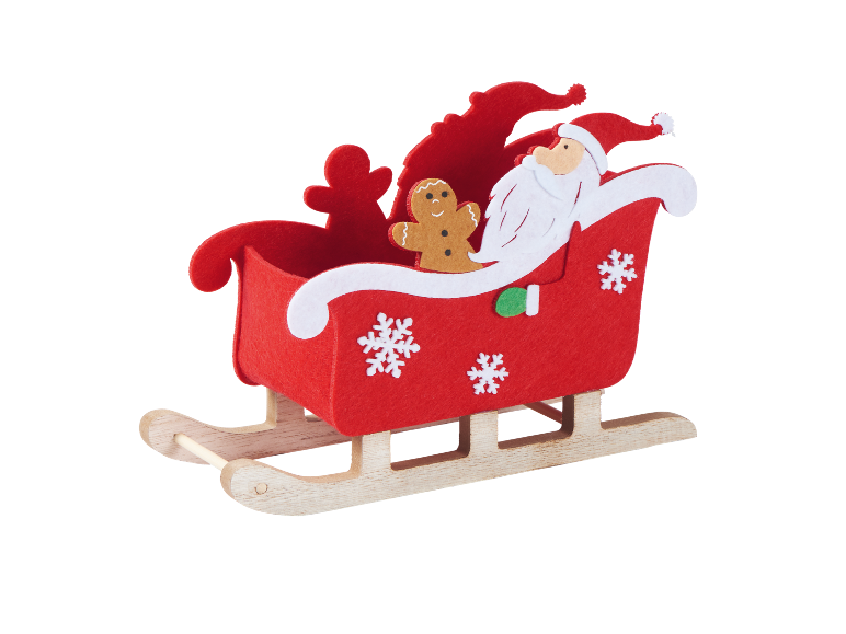 Roter Weihnachtsschlitten mit Weihnachtsmann und Lebkuchenmann.