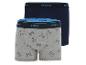 Zwei Boxer-Shorts von Mexx, eine graue mit einem 'M'-Muster und eine dunkelblaue.