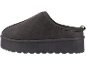 Dunkelgrauer Damen-Slipper mit dicker Sohle und texturierter Zierleiste.