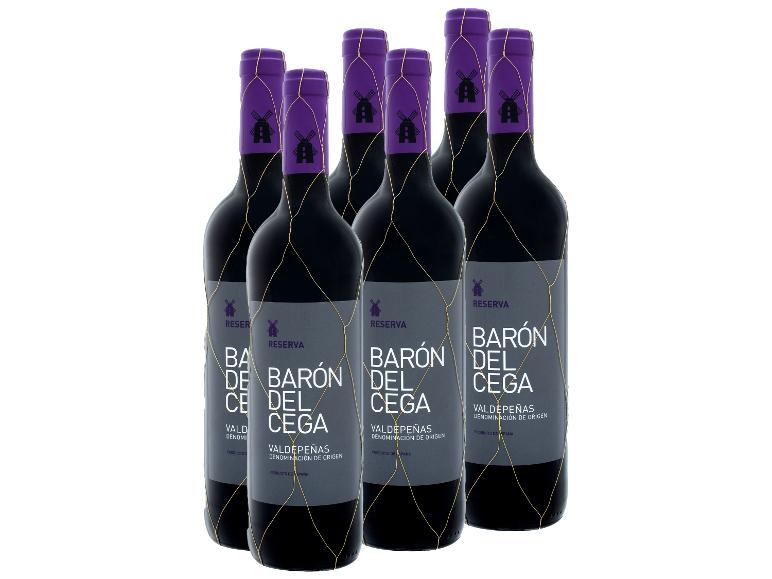 Sechs dunkle Weinflaschen mit violetten Kapseln und goldenem Netz, die Etiketten tragen die Aufschrift „RESERVA“ und „VALDEPEÑAS“.