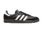 Schwarze Sportschuhe mit drei weißen Streifen und Wildlederdetails.