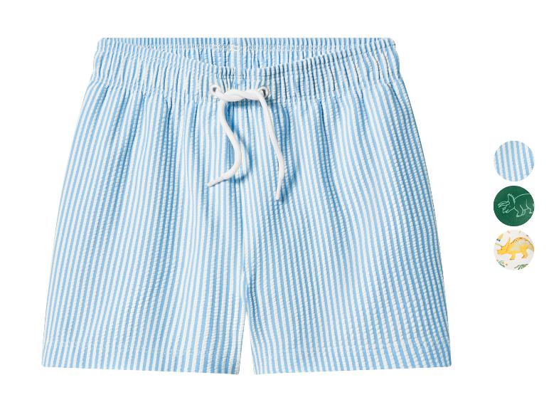Blau-weiß gestreifte Badeshorts mit Kordelzug, mit Dinosaurier-Designoptionen.