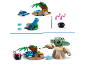 Zwei Lego-Sets: ein Baby-Alien-Charakter und eine Insel mit einem Lagerfeuer und einem Frosch.