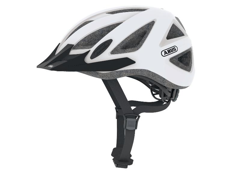 Weißer Fahrradhelm mit schwarzem Visier und Riemen, von der Seite gezeigt.