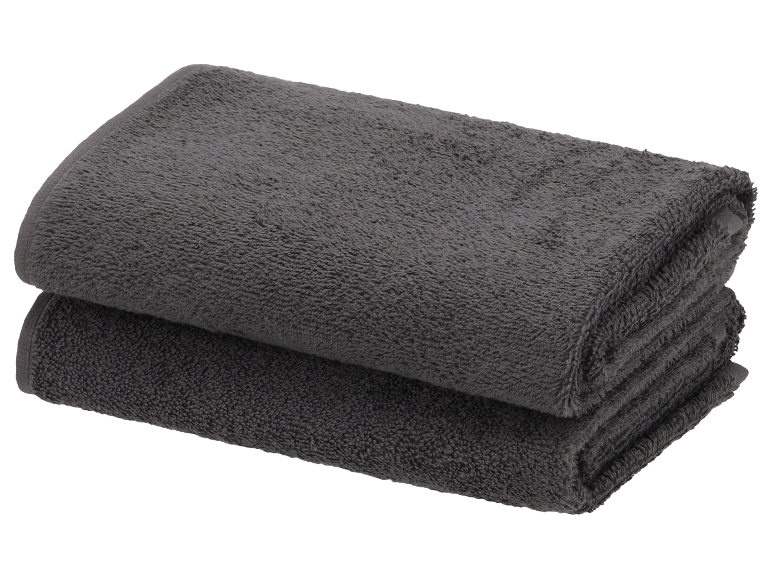 Zwei graue Badetücher aufeinander gestapelt.