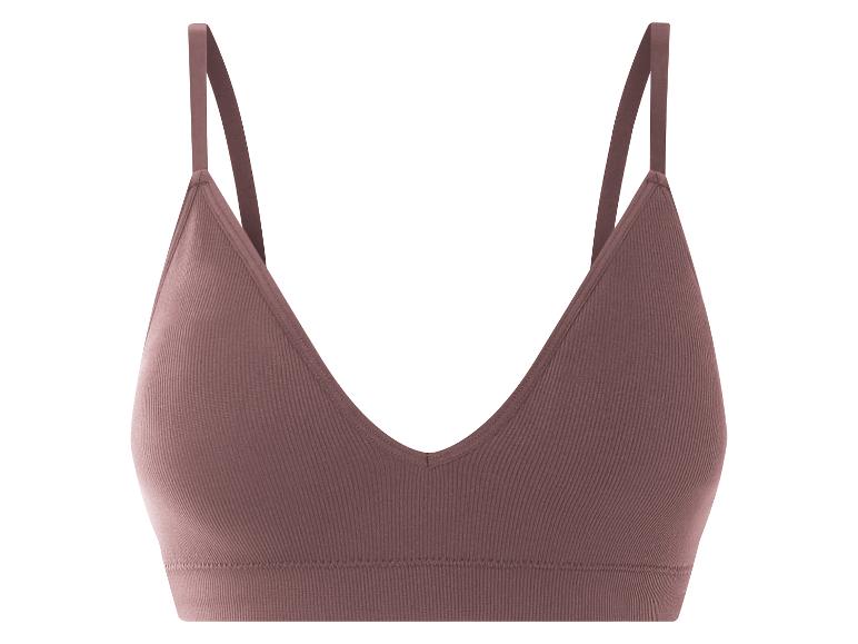 Ein rosafarbener Sport-BH mit breiten Trägern.