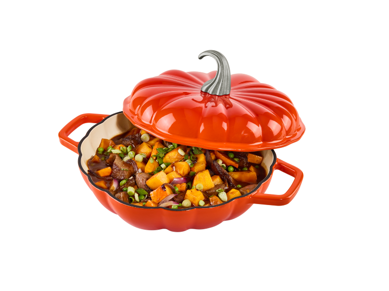 Kürbisförmiger Topf mit Herbst-Eintopf