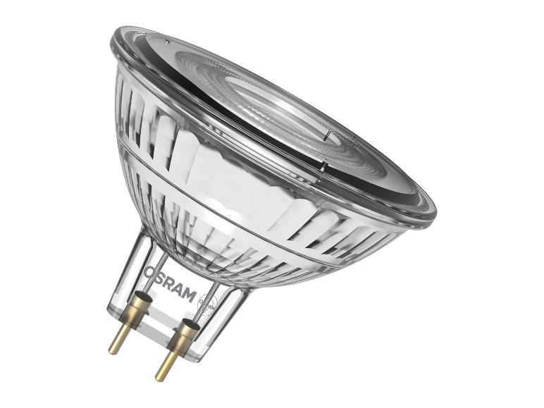 Glashalogenlampe mit zwei Stiften und geriffelter Oberfläche, schräg positioniert.