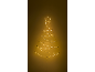 Beleuchtete Weihnachtsbaum-Wanddekoration mit Sternspitze, warm leuchtend vor dunklem Hintergrund.