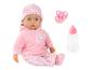 Babypuppe in rosa Kleidung mit Herzen, Schnuller und Fläschchen.