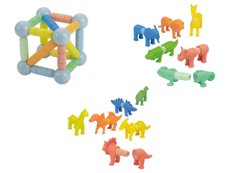 Buntes Magnetbauset und zusammensteckbare Tierfiguren.
